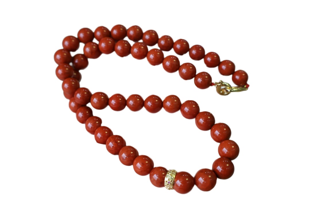 9mm Nanhong Agate Beads Necklace: 9mm Nanhong Agate Beads Necklace Dimension: 9 (mm) 0.35 (inches) Weight: 0.11 lbs/ 52.6 g