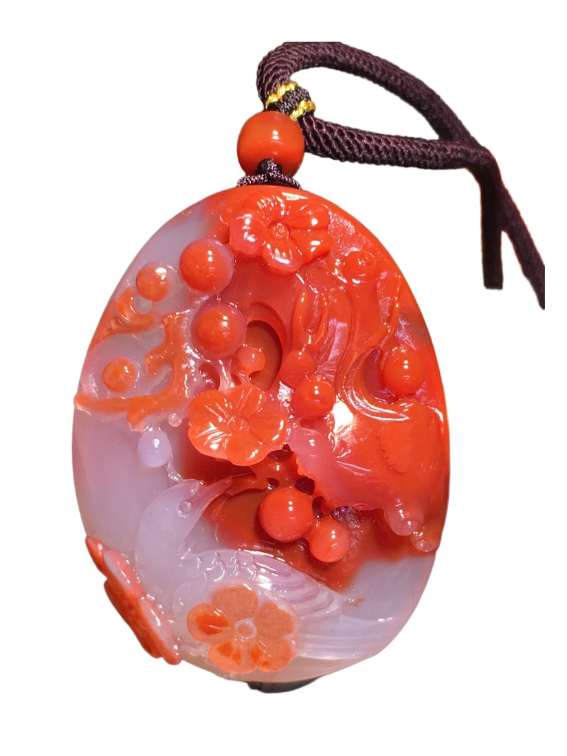 Nanhong Agate Hand-Carved Pendant w Plum Flower & Magpie: Nanhong Agate Hand-Carved Pendant w Plum Flower & Magpie Dimension: 46.7 x 34.9 x 18.9 (mm) 1.84 x 1.37 x 0.74 (inches) Weight: 0.09 lbs/ 42.3 g