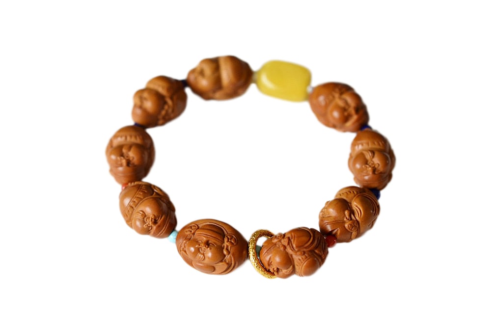 Hand Woven Olive Nut Hand-Carved Fortune Taoism Deity Beads Bracelet: Hand Woven Olive Nut Hand-Carved Fortune Taoism Deity Beads BraceletDimension: 21 x 17 (mm) 0.83 x 0.67 (inches)