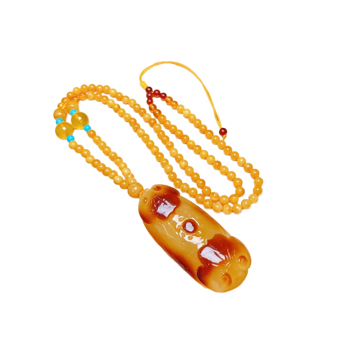 Natural Beeswax Hand-Carved Pendant w Ruyi & w Hand Woven Beeswax Beads Necklace: Natural Beeswax Hand-Carved Pendant w Ruyi & w Hand Woven Beeswax Beads Necklace Dimension: 57 x 26 x 16 (mm) 2.24 x 1.02 x 0.63 (inches) Weight: 0.06 lbs/ 26.4 g