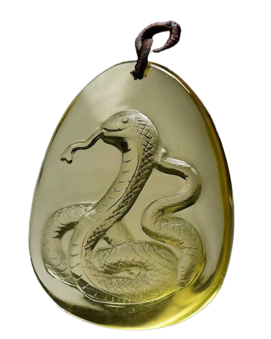 Yellow Crystal Hand-Carved Pendant w Snake & Hand Woven Necklace: Yellow Crystal Hand-Carved Pendant w Snake & Hand Woven NecklaceDimension: 43 x 33 x 14 (mm) 1.69 x 1.30 x 0.55 (inches) Weight: 0.07 lbs/ 31 g