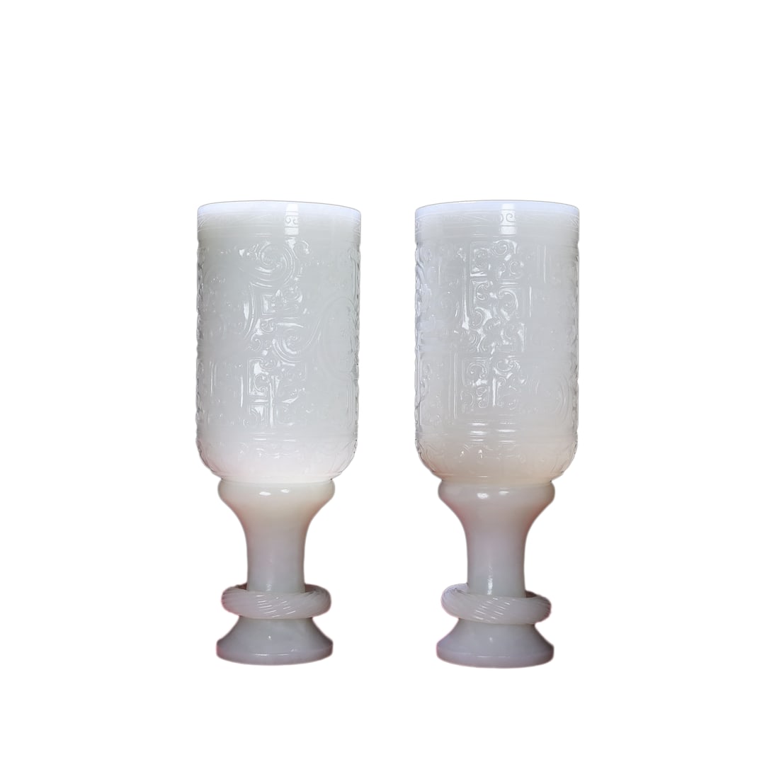A Pair White Hetian Jade Hand-Carved Cups: A Pair White Hetian Jade Hand-Carved Cups,The jade is fine-grained, white, and lustrous.Single Dimension: 155 x 56 (mm) 6.10 x 2.20 (inches) Total Weight: 1.66 lbs/ 754 g