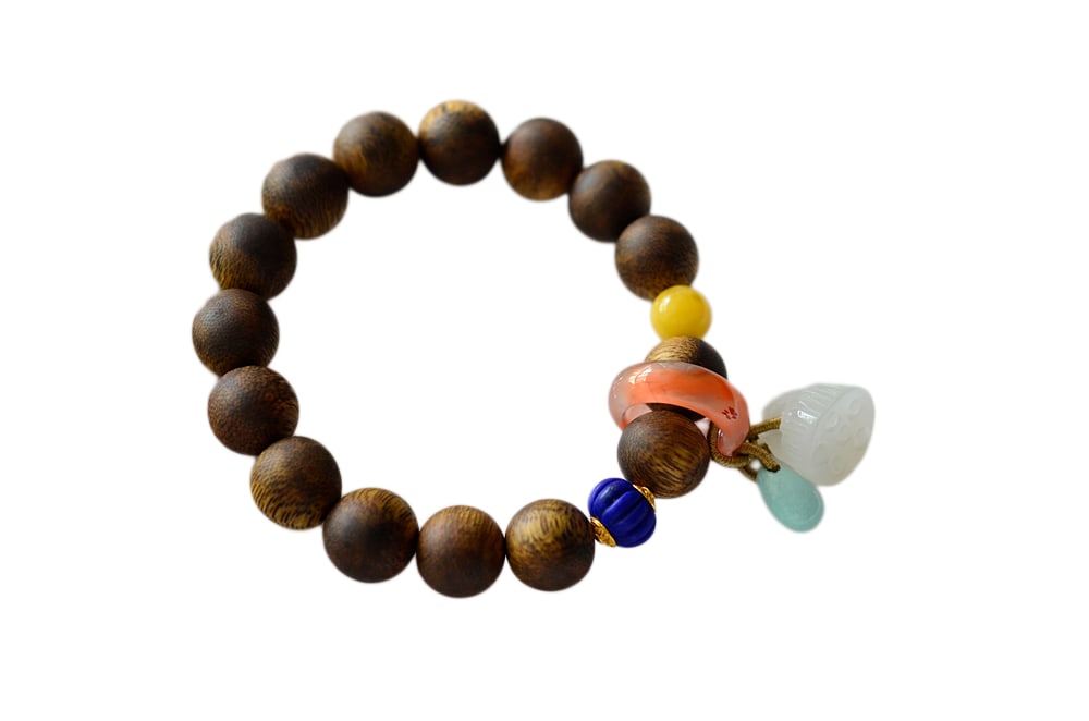 Hand Woven Chenxiang Wood & Lapis Lazuli Beads Bracelet: Hand Woven Chenxiang Wood & Lapis Lazuli Beads BraceletDimension: 12 (mm) 0.47 (inches)