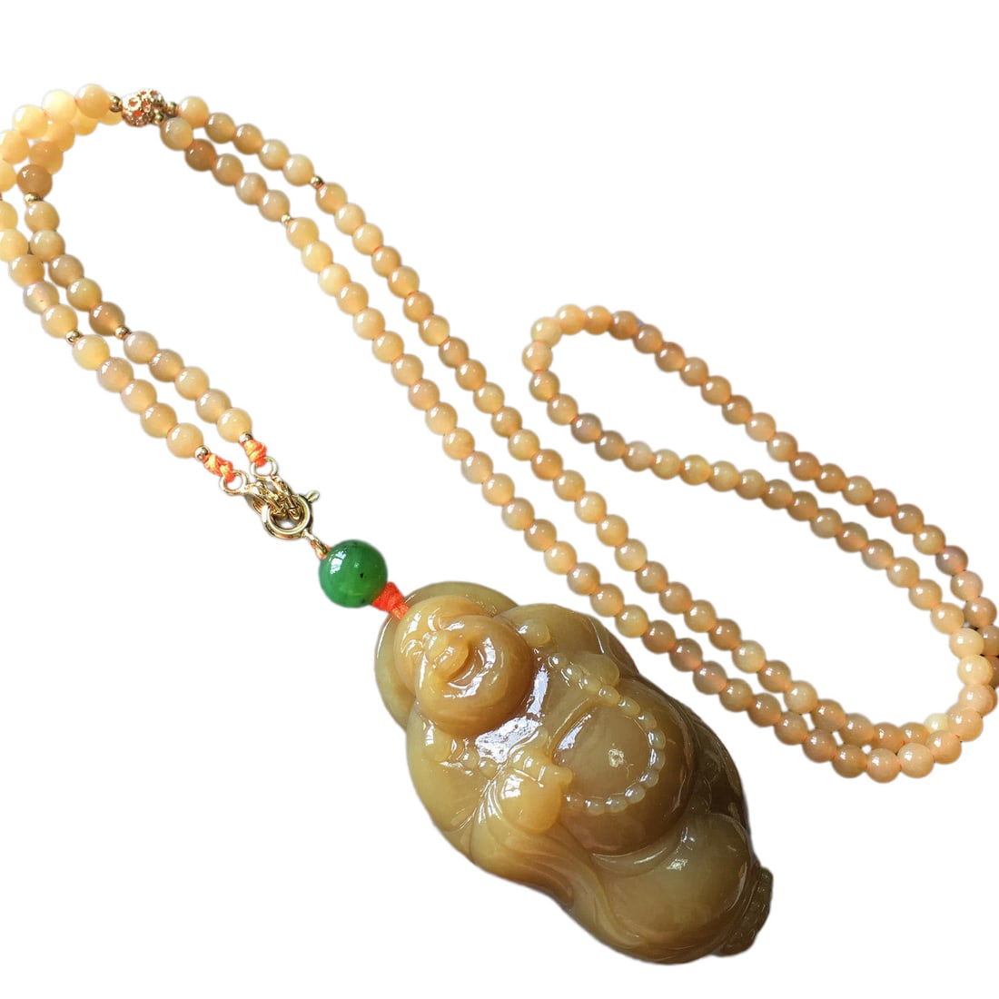 Natural Hetian Jade Hand-Carved Pendant w Laughing Buddha: Natural Hetian Jade Hand-Carved Pendant w Laughing BuddhaDimension: 52 x 35 x 21 (mm) 2.05 x 1.38 x 0.83 (inches) Weight: 0.12 lbs/ 57 g