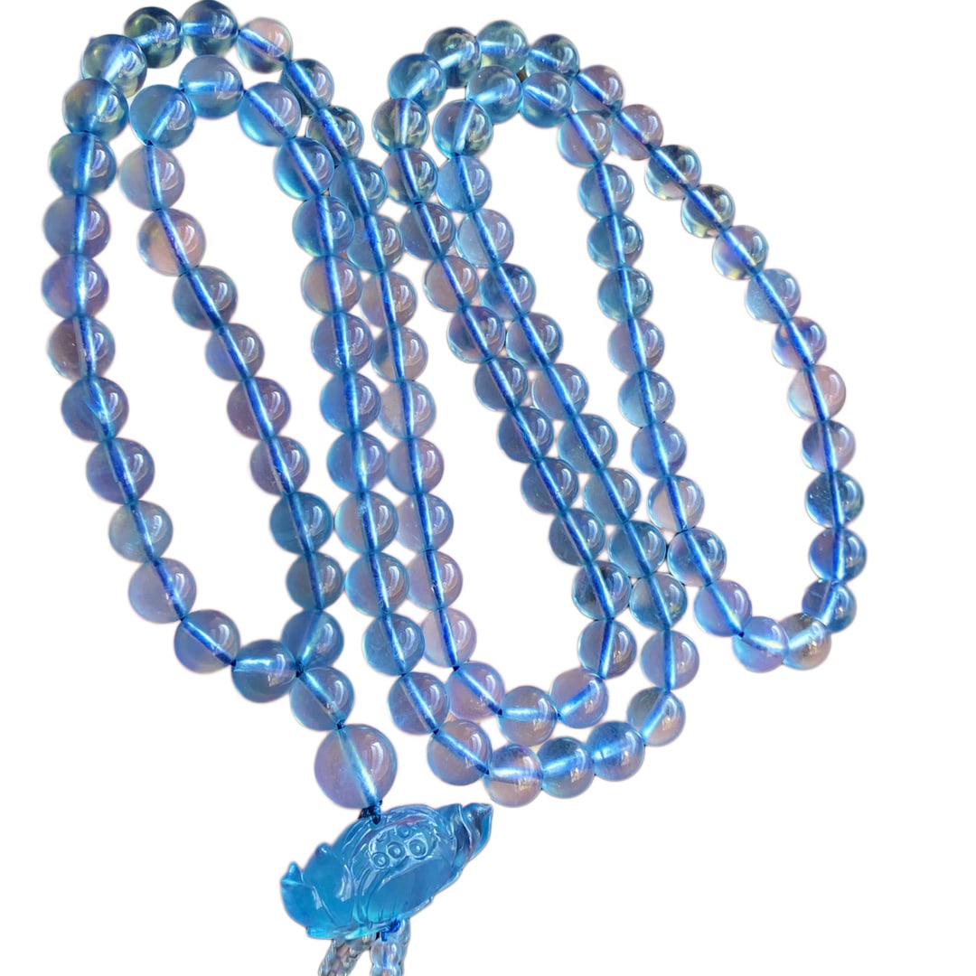 Hand Woven Aquamarine Beads Necklace w Lotus Flower Pendant: Hand Woven Aquamarine Beads Necklace w Lotus Flower PendantDimension: 8.2 (mm) 0.32 (inches) Weight: 0.20 lbs/ 91.6 g
