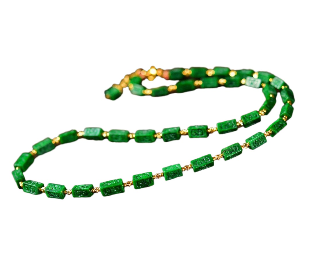 18K Gold Buckle Green Jadeite Beads Necklace: 18K Gold Buckle Green Jadeite Beads NecklaceDimension: 4.4 x 6.6 (mm) 0.17 x 0.26 (inches) Dimension: 9.3 x 4.5 (mm) 0.37 x 0.18 (inches)