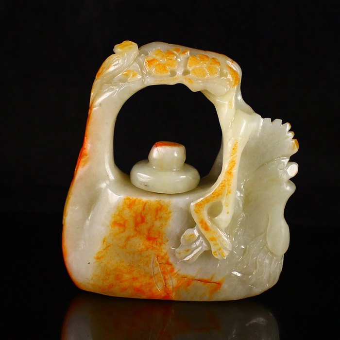 Hand Carved Chinese Natural Hetian Jade Teapot: Hand Carved Chinese Natural Hetian Jade Rooster Head Teapot Dimension:76*23*67(mm)2.99*0.91*2.64(in)Weight 0.31 lbs/142gTips about Chinese Hetian Nephrite JadeHetian jade is a nephrite jade and is reg