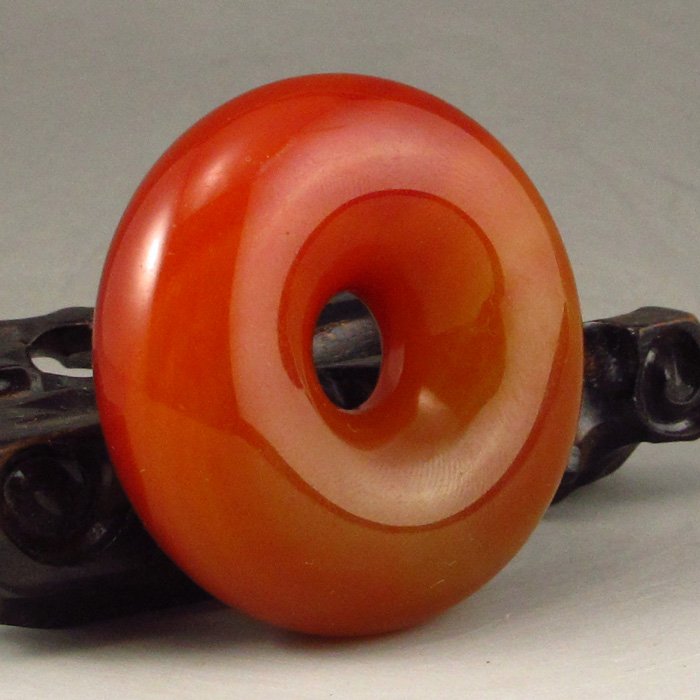 Chinese Natural Red Agate Lucky Ring: Hand Carved Chinese Natural Red Agate Lucky Ring Dimension: 55*55*19(mm) 2.17*2.17*0.75(in) Weight 0.19 lbs/86 gAgate is a code, Ma Nao, horse brain, is a kind of mineral chalcedony class, is often mi