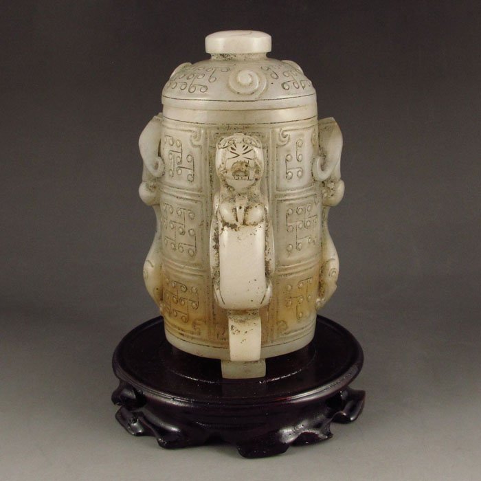 Old Chinese Natural Hetian Jade Bottle w Chi Dragon: Old Chinese Natural Hetian Jade Bottle w Chi Dragon Dimension: 135*90*90 (mm) 5.31*3.54*3.54 (in) Weight 1.33 lbs/602g Tips about Chinese Hetian Nephrite Jade Hetian jade is a nephrite jade and is reg