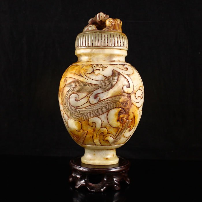 Old Chinese Hetian Jade Bottle Carved Dragon: Old Chinese Hetian Jade Bottle Carved Dragon Dimension: 145*56*84 (mm) 5.71*2.20*3.31 (in) Weight 0.76 lbs/344g Tips about Chinese Hetian Nephrite Jade Hetian jade is a nephrite jade and is regarded a