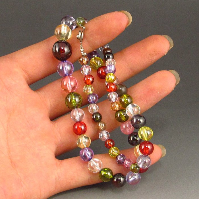 Hand Carved Chinese Natural Colorful Zircon Necklace: Hand Carved Chinese Natural Colorful Zircon Necklace Dimension:7*6*440(mm) 0.28*0.24*17.32 (in) Weight 0.17 lbs/76 g The total weight does not include the base. The base is not included after you have