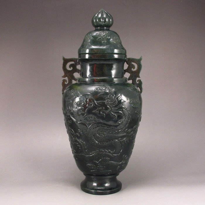 Chinese Hetian Jade Low-relief Flying Dragon Vase: Chinese Qing Dy Natural Green Hetian Jade Low-relief Double Ear Flying Dragon Vase Dimension:240*100*97 (mm)9.45*3.94*3.82 (in) Weight 1.34 lbs/610 g Tips about Chinese Hetian Nephrite JadeHetian jade