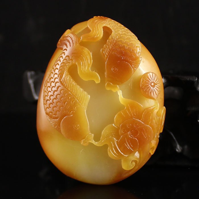 Hand Carved Chinese Hetian Jade Pendant w Fish & Lotus: Hand Carved Chinese Hetian Jade Pendant w Fish & Lotus Dimension:68*53*28 (mm)2.68*2.09*1.10 (in) Weight 0.37 lbs/166gHetian jade is a nephrite jade and is regarded as the only true jade in ancient Ch