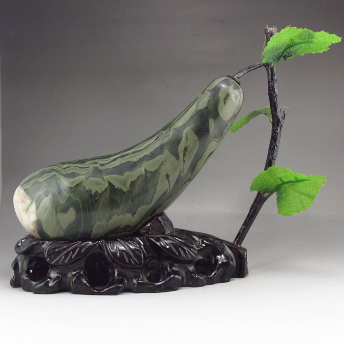 Chinese Natural Watermelon Stone Statue: Chinese Natural Watermelon Stone Statue Dimension: 260*93*90(mm) 10.24*3.66*3.54(in) Weight 6.59 lbs/2990 g The total weight does not include the base. The base is included after you have won the auct