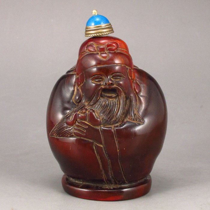 Hand Carved Chinese Ox Horn Snuff Bottle: Hand Carved Chinese Ox Horn Snuff Bottle - Fortune Taoism DeityDimension: 79*43*53(mm) 3.11*1.69*2.09(in) Weight 0.22 lbs/98g Tips about horn sculptureHorn sculpture has a long history. The horn sculp