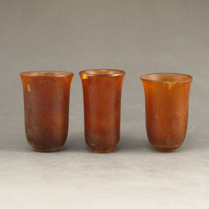 A Set Three Pieces Hand-carved Chinese Ox Horn Cups: A Set Three Piece Hand-carved Chinese Ox Horn Cups Dimension:46*31*31(mm)1.81*1.22*1.22(in) Weight 0.08 lbs/36 gAgate is a code, Ma Nao, horse brain, is a kind of mineral chalcedony class, is often mi