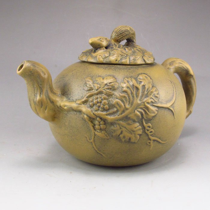 Handmade Chinese Yixing Zisha Clay Teapot w Flower: Handmade Chinese Yixing Zisha Clay Teapot w Flower Dimension: 158*100*90(mm)6.22*3.94*3.54(in) Weight 0.57 lbs/260g There are a variety of Zisha mud color, remove the main red clay, sand clay, there a