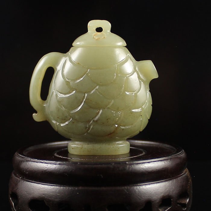 Chinese Natural Hetian Jade Fish Shape Teapot: Chinese Natural Hetian Jade Fish Shape Teapot Dimension: 53*52*22(mm) 2.09*2.05*0.87 (in) Weight 0.10 lbs/46g Tips about Chinese Hetian Nephrite Jade Hetian jade is a nephrite jade and is regarded as