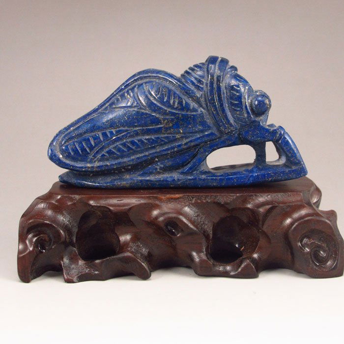 Chinese Natural Lapis Lazuli Statue - Cicada: Hand-carved Chinese Natural Lapis Lazuli Statue - Cicada Dimension: 92*47*27 (mm) 3.62*1.85*1.06 (in) Weight 0.40 lbs/180 g The total weight does not include the base. The base is not included after y