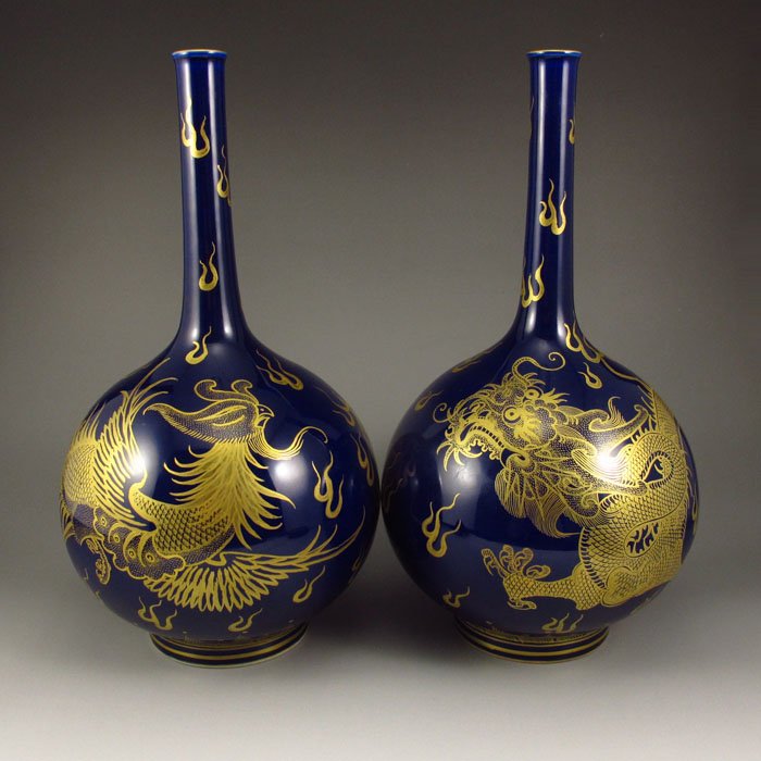 A Pair Gold-plating Blue Glaze Tian Qiu Vase: A Pair Superb Gold-plating Blue Glaze Tian Qiu Dragon Phoenix Vase w Marked Dimension:255*135*135(mm)10.04*5.31*5.31(in) Weight 3.57 lbs/1619 gTips about Chinese Porcelain Chinese ceramic ware is an a