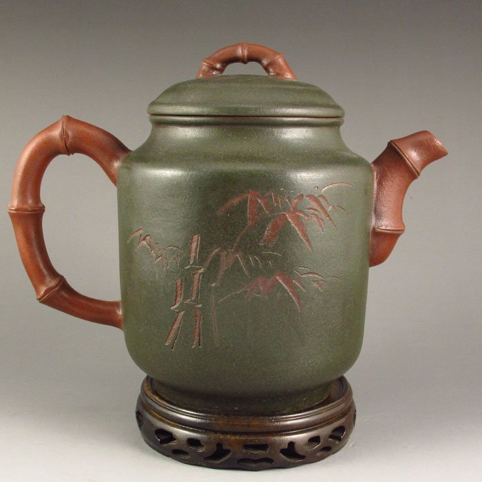Handmade Chinese Yixing Zisha / Purple Clay Teapot: Handmade Chinese Yixing Zisha / Purple Clay Teapot w Artist Signature Dimension:190*140*105 (mm)7.48*5.51*4.13 (in) Weight 1.00 lbs/454g The total weight does not include the base. The base is not inc
