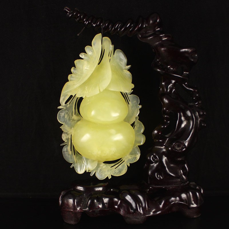 Beautiful Chinese Natural Jade Statue - Gourd: Beautiful Chinese Natural Jade Statue - Gourd Dimension:170*105*45(mm) 6.69*4.13*1.77(in) Weight 0.99 lbs/450 gThe total weight does not include the base. The base is included after you have won the a