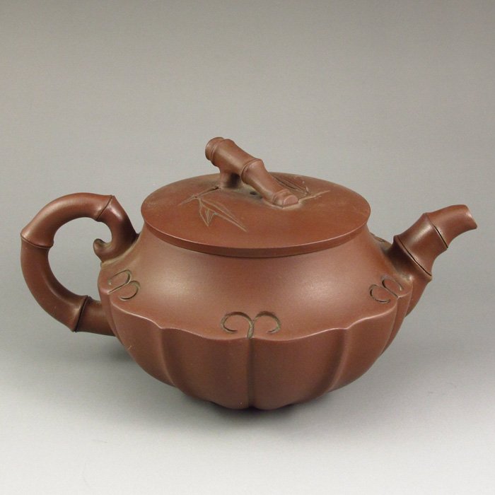 Handmade Chinese Yixing Zisha / Purple Clay Teapot: Handmade Chinese Yixing Zisha / Purple Clay Teapot Dimension: 117*120*95 (mm) 4.61*4.72*3.74(in) Weight 0.86 lbs/389 gThere are a variety of Zisha mud color, remove the main red clay, sand clay, there