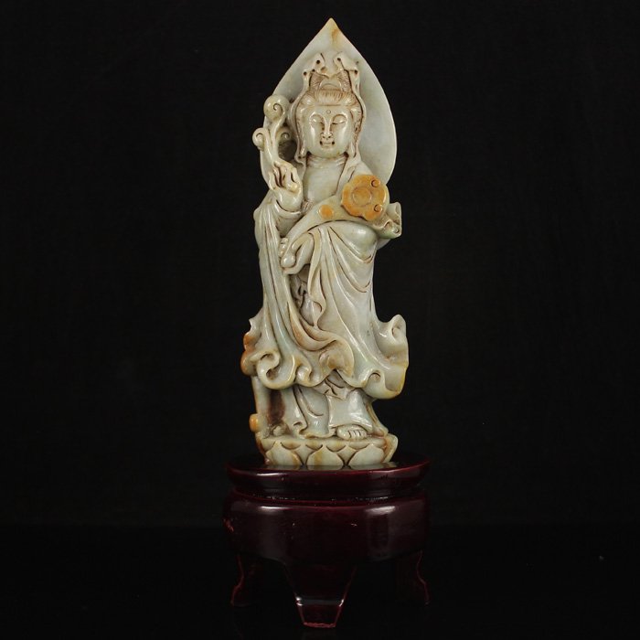Hand Carved Natural Jadeite Statue - Ruyi Kwan-yin: Superb Hand Carved Natural Jadeite Statue - Ruyi Kwan-yin Dimension:165*60*22(mm)6.50*2.36*0.87(in) Weight 0.73 lbs/330 g Tips about Jadeite Jade Jadeite generally occurs in metamorphic rocks with a h
