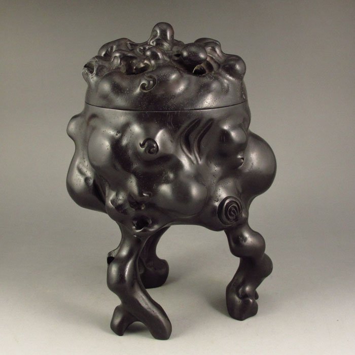 Chinese Natural Black Sanders Wood 3 Leg Incense Burner: Chinese Natural Black Sanders Wood 3 Leg Incense Burner Dimension: 135*130*200 (mm) 5.31*5.12*7.87 (in) Weight 2.02 lbs/917g Tips for wood art craftThe wood sculpture is popular for collectors. The fi