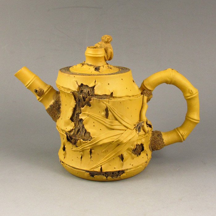 Handmade Chinese Yixing Zisha / Purple Clay Teapot: Handmade Chinese Yixing Zisha / Purple Clay Teapot Dimension:144*79*105 (mm) 5.67*3.11*4.13 (in) Weight0.63 lbs/286g There are a variety of Zisha mud color, remove the main red clay, sand clay, there 