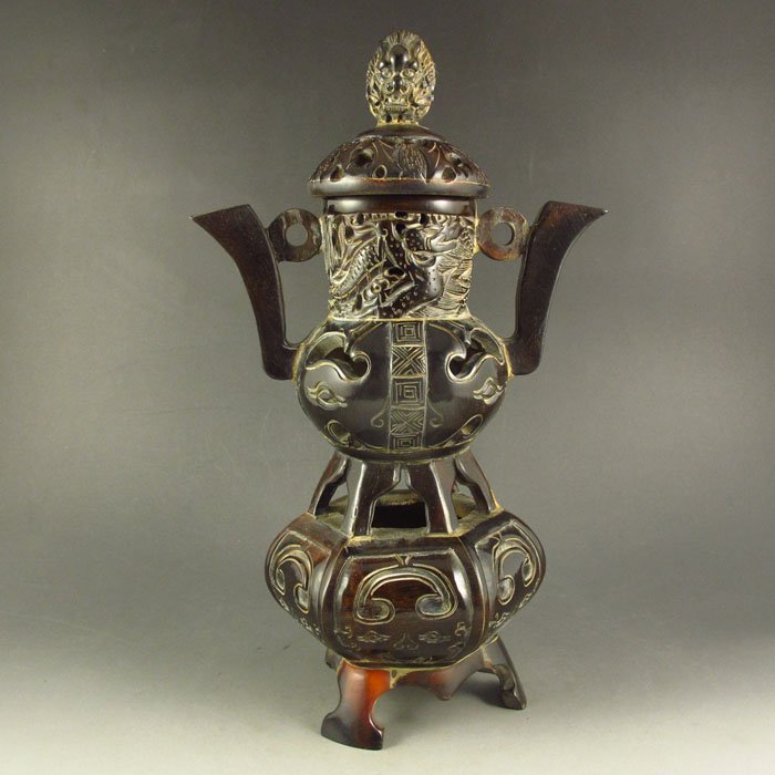 Hand Carved Chinese Ox Horn Incense Burner: Hand Carved Chinese Ox Horn Incense Burner Dimension: 275*120*120(mm) 10.83*4.72*4.72(in) Weight 1.00 lbs/454 g Tips about horn sculptureHorn sculpture has a long history. The horn sculpture is usuall