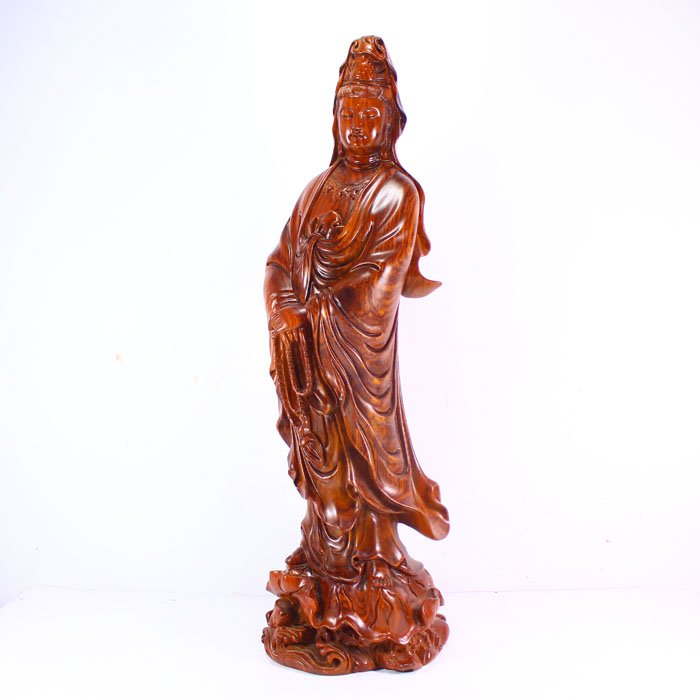 Superb Vietnam Huanghuali Wood Statue - Kwan-yin: Superb Hand Carved Natural Vietnam Huanghuali Wood Statue - Kwan-yin Dimension: 585*190*150(mm) 23.03*7.48*5.91(in) Weight 10.34 lbs/4688 g Tips for wood art craft The wood sculpture is popular for co