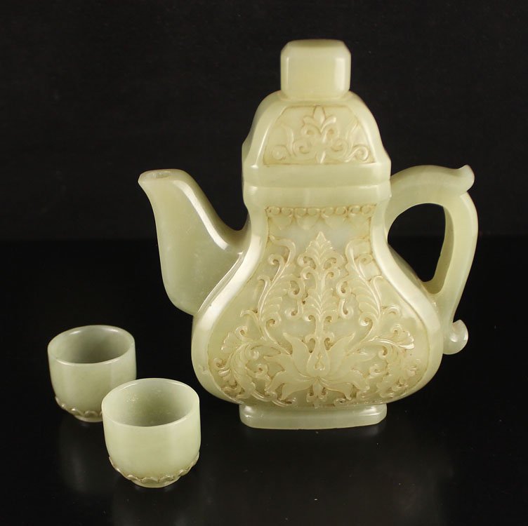 Vintage Chinese Hetian Jade Low-relief Wine Pot & Cups: Chinese Qing Dy Hetian Jade Low-relief Wine Pot & Cups Dimension: 125*115*40(mm) 4.92*4.53*1.57(in) Weight 0.67 lbs/304 g Tips about Chinese Hetian Nephrite Jade Hetian jade is a nephrite jade and is 