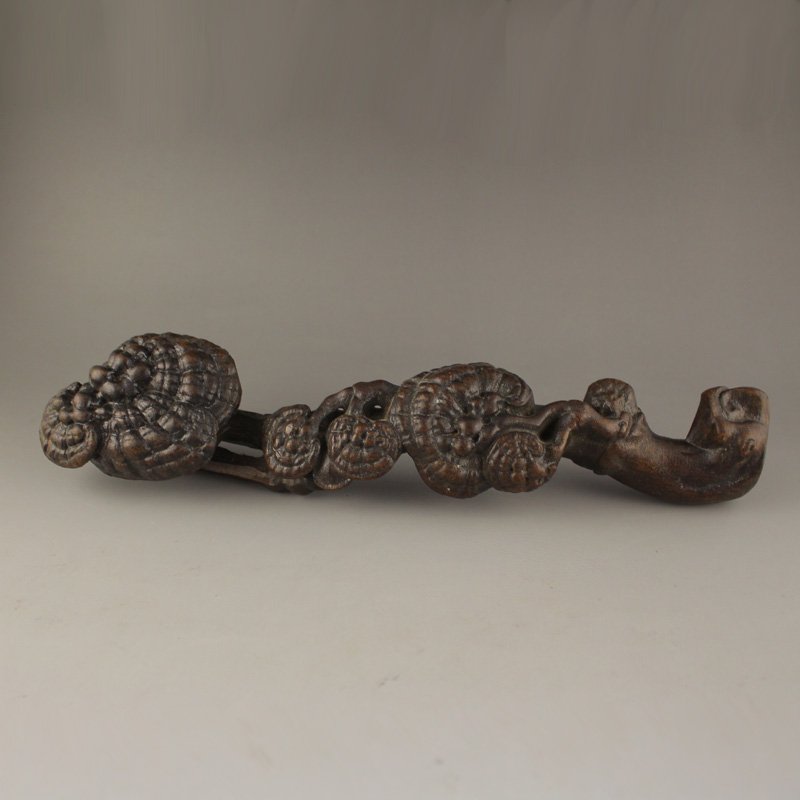 Chinese Chenxiang Wood Ruyi Scepter: Chinese Chenxiang Wood Ruyi Scepter Dimension: 260x55x43(mm) 10.24x2.17x1.69 (inches) Weight 0.43 lbs/196 g