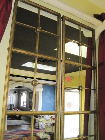 MacKenzie-Childs Complements Mirror Panel Pair: Gilt frames. 26 3/4" wide (total width for panels together) x 65" high. $200. Each.