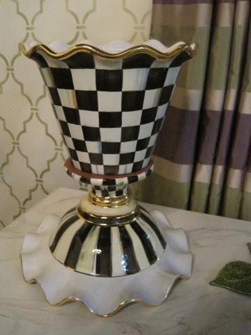 MacKenzie-Childs Courtly Check Flower Pot & Compot: Courtly Check compote & flower pot are hand painted in color-dragged black and white on handmade terra cotta and embellished with lustre. Compote 12.5" diameter, 6.5" tall. Flower pot is 10.5" wide, 8