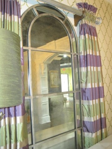 Horchow Paris Metro Arched Wall Mirror: Antiqued mirror with stained metal frame and overlay. 28.25" wide x 1" deep x 83" tall. Winning bidder gets one mirror.