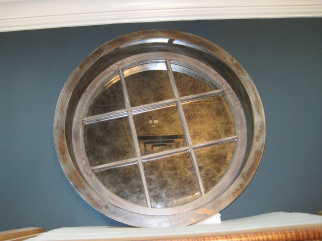Round Jonathan Mirror: Port-hole style mirror with wooden frame. 30" in diameter.