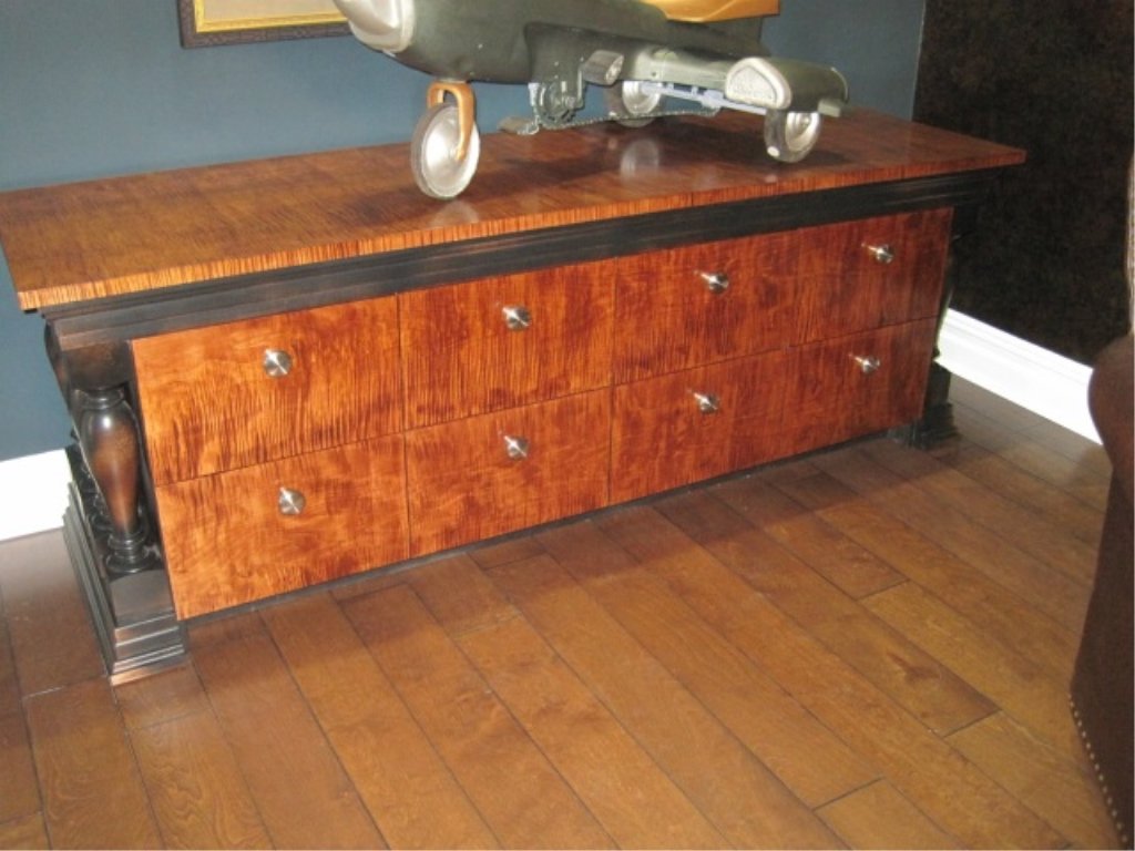 The Tiger Maple Credenza: Fabricated by Ron Cosser, The Craftsman. Custom design. One of a kind piece. Solid tiger maple with black stained maple trim and balusters. NO VENEER. Original Cost: $7,500. 26" x 84 3/4". 30" high.