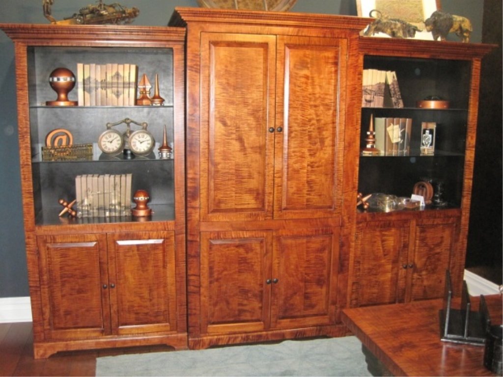 Tiger Maple Entertainment Center: NO VENEER. Center Unit can be used for t.v. Bottom of center unit has drawers for dvd storage. Built in 1988 by Todd Weller, Watertown, NY. 9' 6" wide (all components). Two Outer: 36" wide x 20" deep 