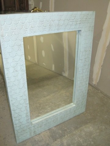 MacKenzie-Childs Complements Mirror: Large Tooled Sea Blue Mirror. 31 1/4" wide x 41 1/2" tall. $750.