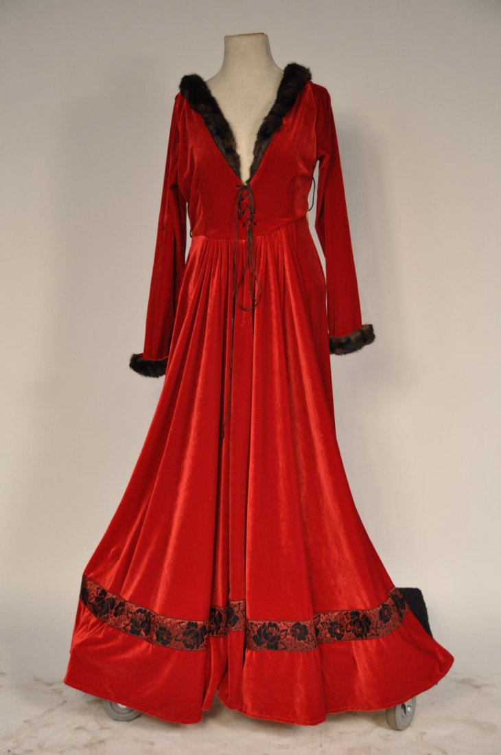 A Fine Renaissance Stlye Screen Worn Gown: A detailed quality made red renaissance style prop costume used in a film