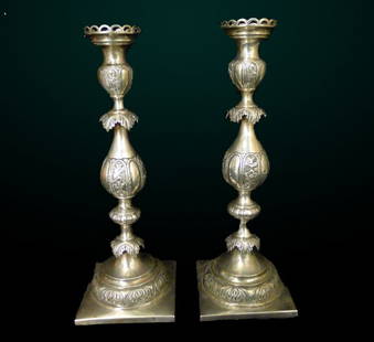 Pair of "84" Russian Engraved Silver Candlesticks: Pair of "84" Russian Embossed & Engraved Silver Candlesticks, Hallmarked and dated "1874 & 1892, J.A Goldman." Dimensions: Height: 14.25" (36.195 cm)