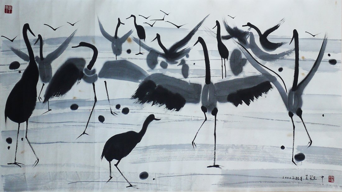A PAINTING OF CRANES ATTRIBUTED TO WU GUANZHONG: a paper attributed to Wu Guanzhong, painted with bold brushstrokes in black on canvas, depicting group of cranes and birds gathering on a landscape, lower portion with script and red seal. Wu Guanzhon