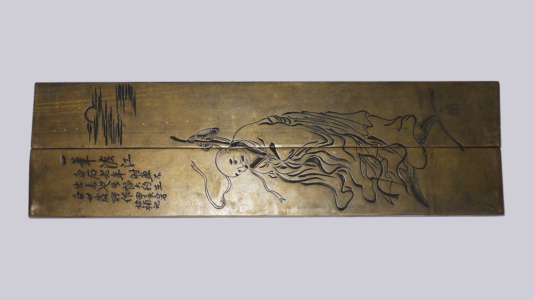 A PAIR OF BRONZE 'MONK' PAPER WEIGHT USED BY QI BAISHI: with black decoration and inscriptions, the front left having Qi Baishi mark, the base stamp marked Xiu Wen.铜秀文镇纸(一双）/