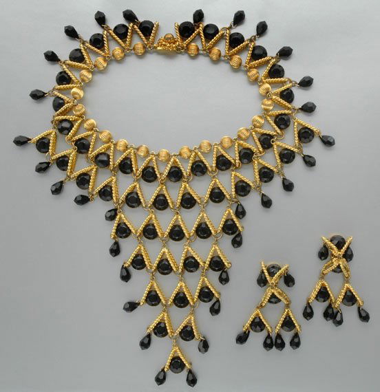 Wm. de Lillo Articulated Bib and Earring Set: Wm. de Lillo Articulated Bib and Earring Set Designed by Robert F. Clark, American, circa 1968 Bib of oval twisted 18 kt. gold electroplated links soldered in vertical V design, 7 x 5 1/2 inches, cen