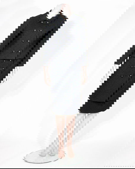 Yves Saint Laurent Couture Supple Black Wool Days: Yves Saint Laurent Couture Supple Black Wool Daysuit French, 1964 Boxy double breasted jacket with pointed collar and set in two piece sleeves, faux black leather buttons at front closure and sleeve