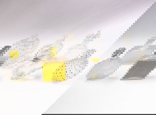 Group of Group of Perfume Flacons: Group of Group of Perfume Flacons Comprising Molinard de Molinard, 1980, Lalique bottle, see Ball and Torem, 1996, Fragrance Bottle Masterpieces, p.118; Guerlain Paris designed by Raymon