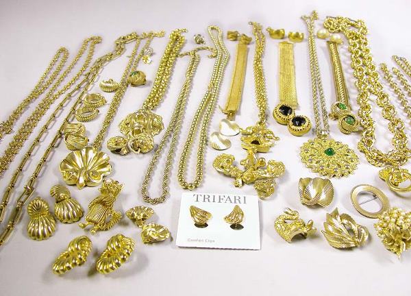 Group of Assorted Metal Jewelry: Group of Assorted Metal Jewelry Comprising metal earrings, chains, bracelets, pendants and pins.