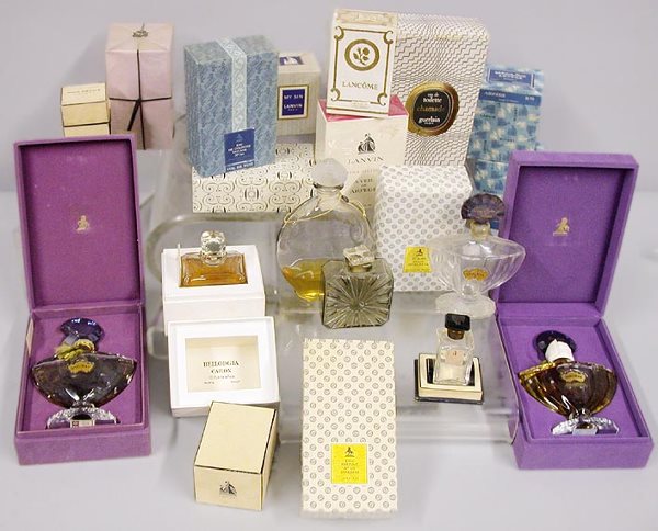 Collection of Perfume Bottles: Collection of Perfume Bottles Including Lanvin, Guerlain, Rochas, Piguet, etc., approximately twelve bottles.